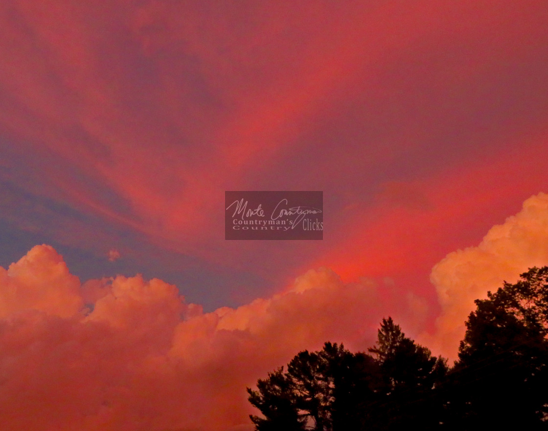 "Storm Clouds Near Sunset After Island Lake in Late Summer" stock image