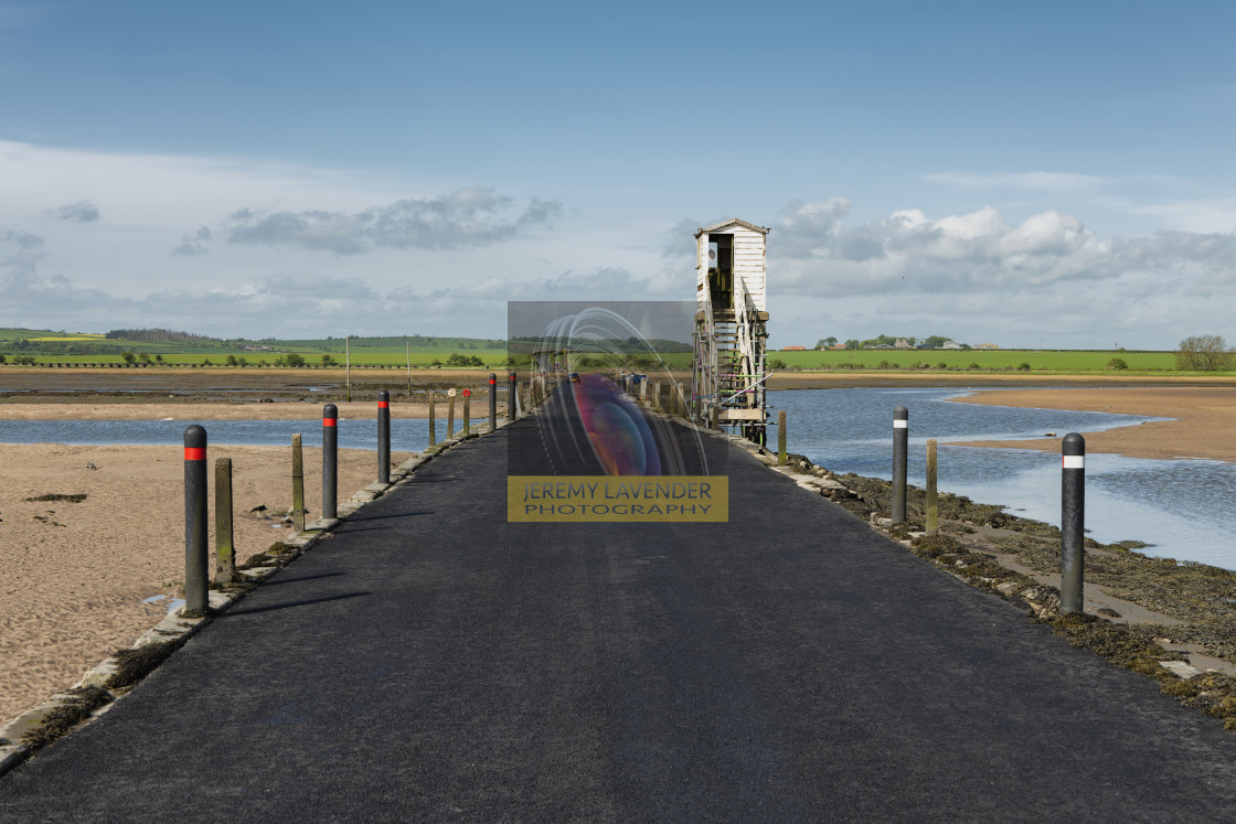 "The Holy Island causeway of Lindisfarne" by Jeremy Lavender Photography - $37.29 "The Holy Island causeway of Lindisfarne" stock image