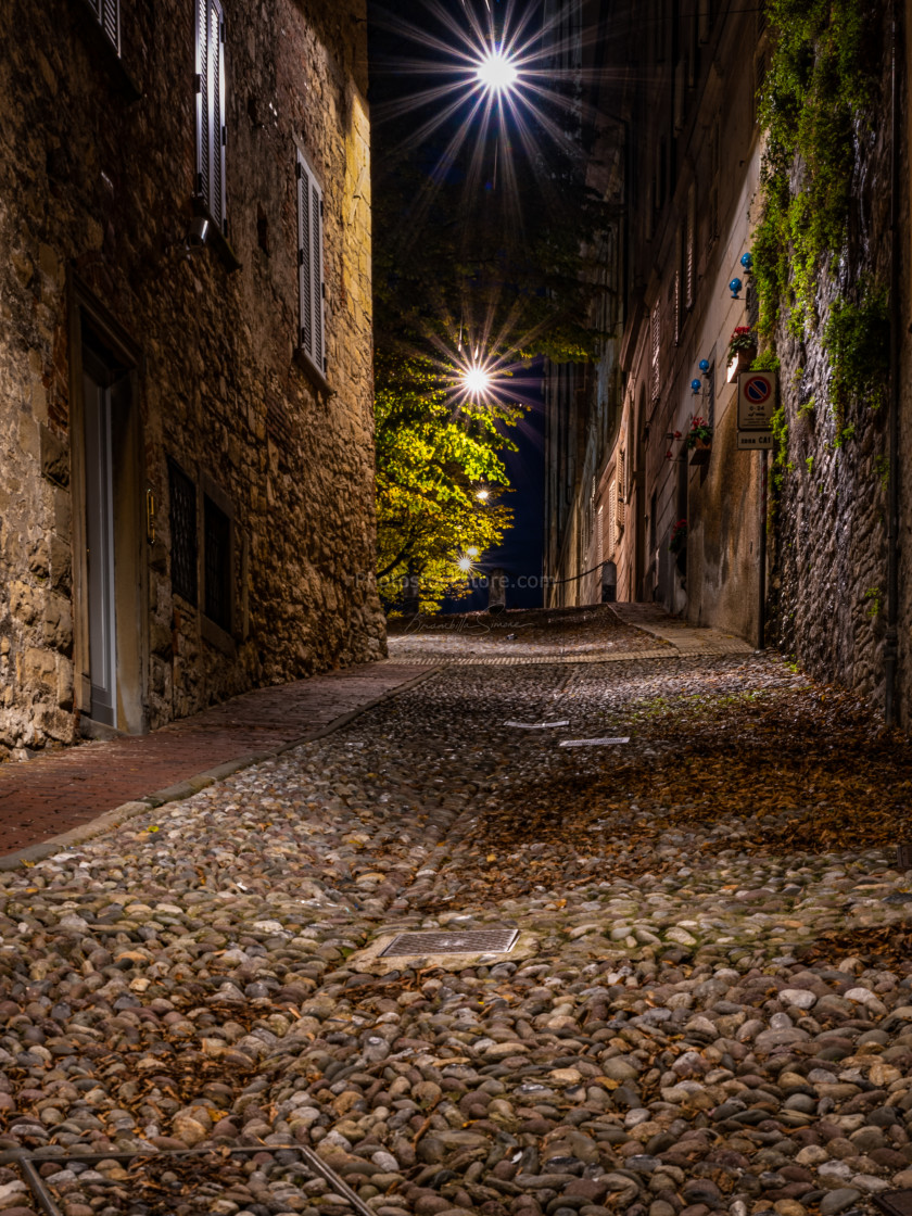 "Medieval street that goes up narrow towards Bergamo Alta in the" by Brambilla Simone - £6.72 "Medieval street that goes up narrow towards Bergamo Alta in the" stock image