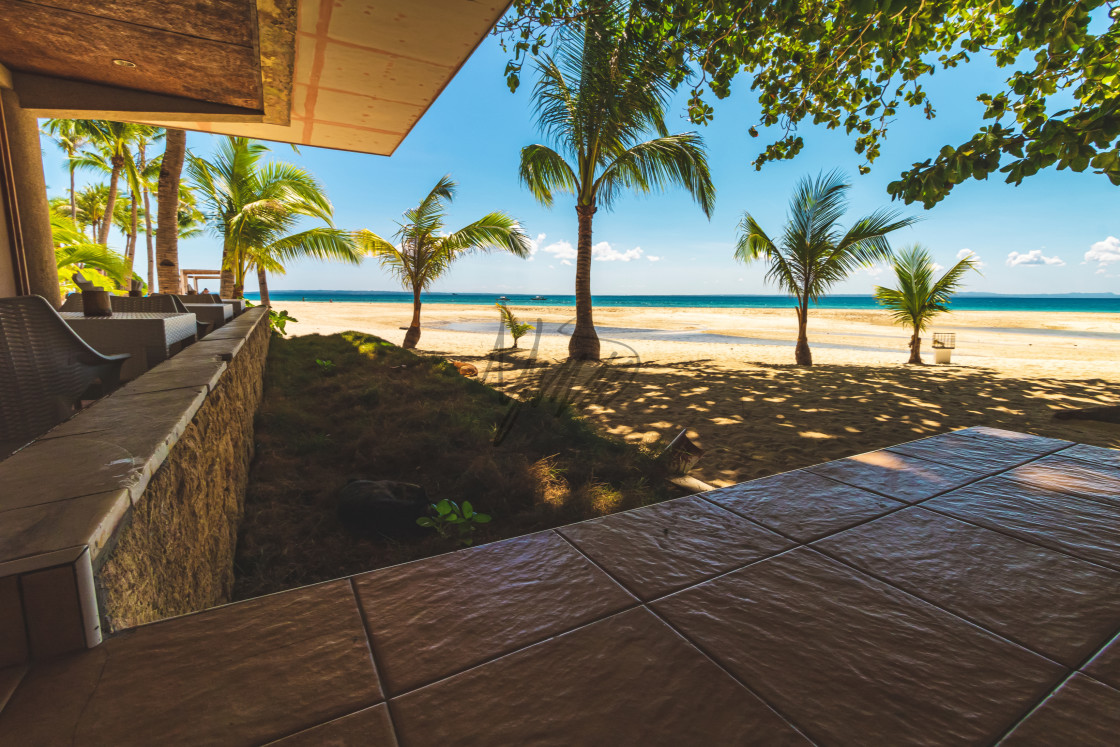 "Taking Shade At Kota Resort Beneath The Palm Trees - Bantayan, The Philippines" by Lewis Fink - £10.00 "Taking Shade At Kota Resort Beneath The Palm Trees - Bantayan, The Philippines" stock image