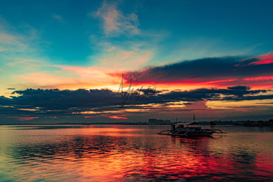 "Clouds On Fire As The Sun Sets Over Pacific Resort - Cebu, Philippines, Asia" by Lewis Fink - £10.00 "Clouds On Fire As The Sun Sets Over Pacific Resort - Cebu, Philippines, Asia" stock image