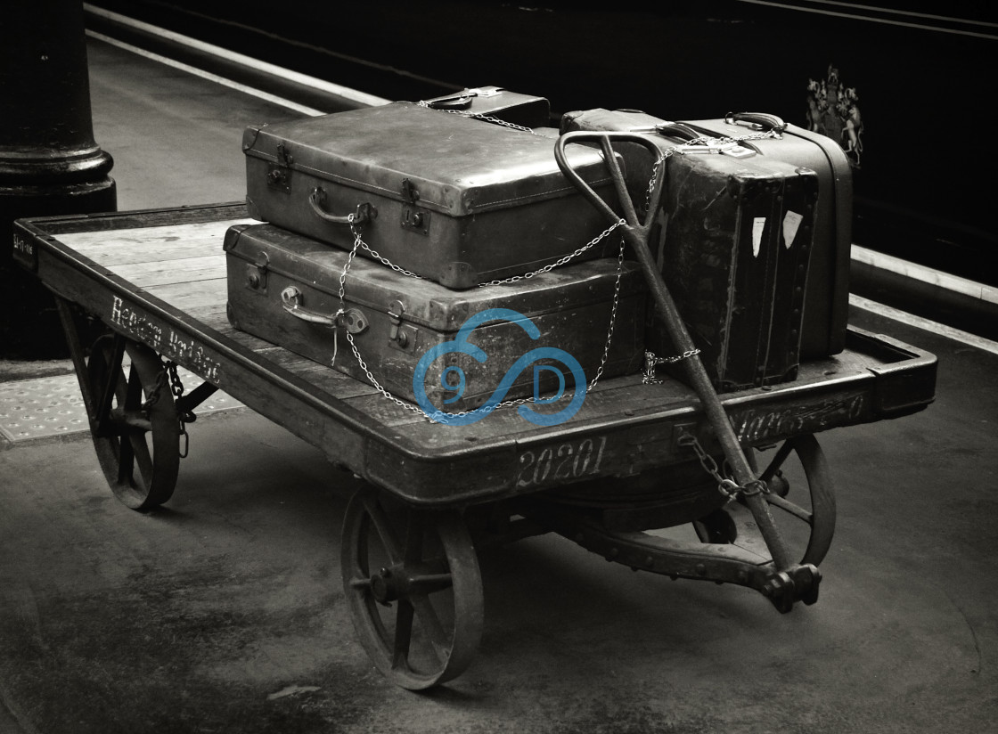 "Old Suitcases on Railway Porters Trolley" stock image