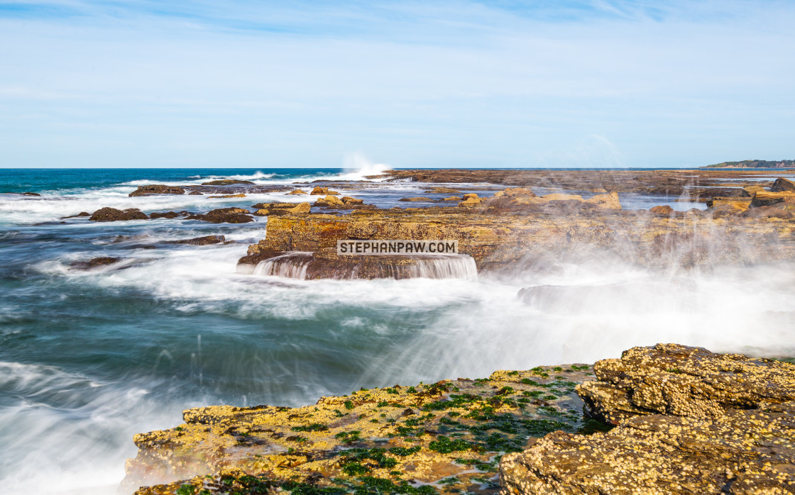 "Swirling ocean of Turimetta Beach // Sydney, Australia" stock image