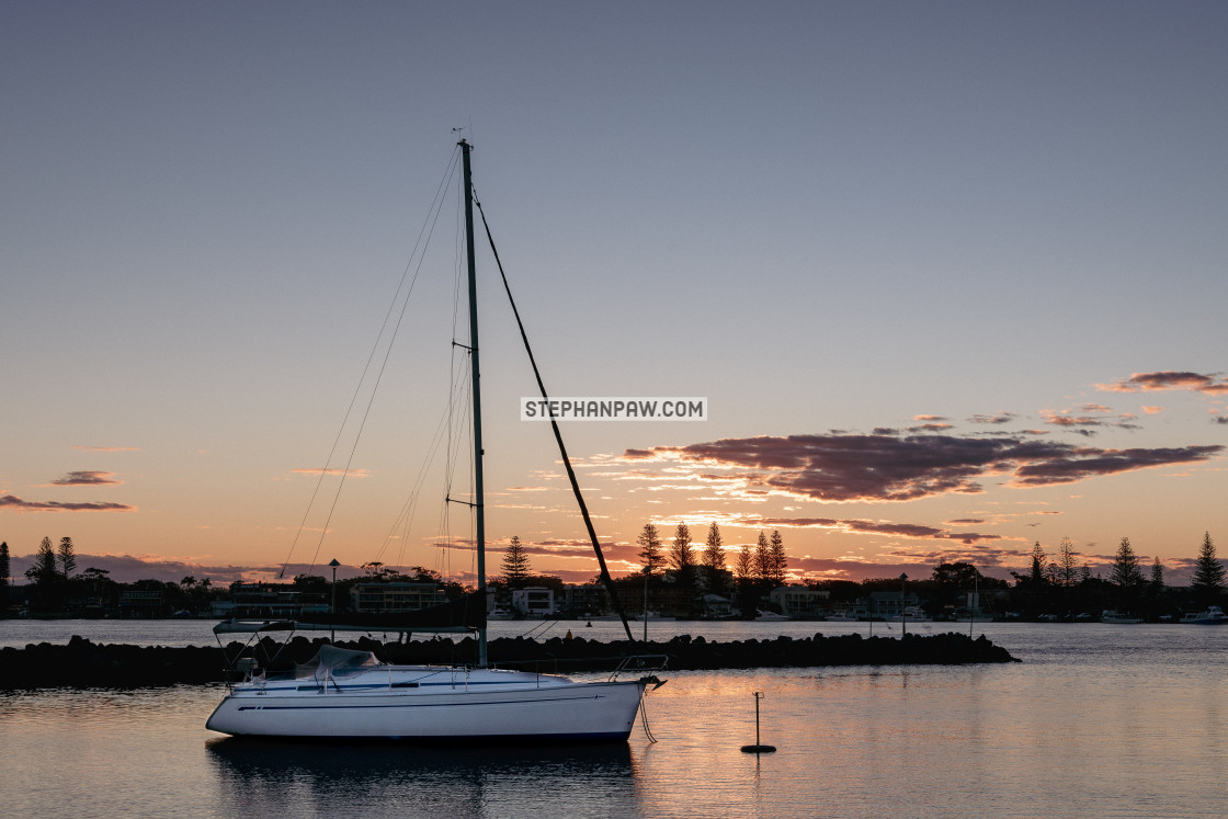 "Lone yacht at sunset // Forster Marina, NSW" stock image