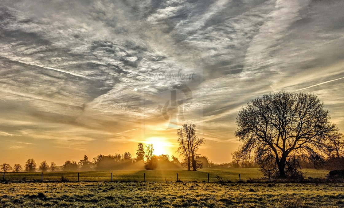 "Streaks in the sky at sunset" stock image