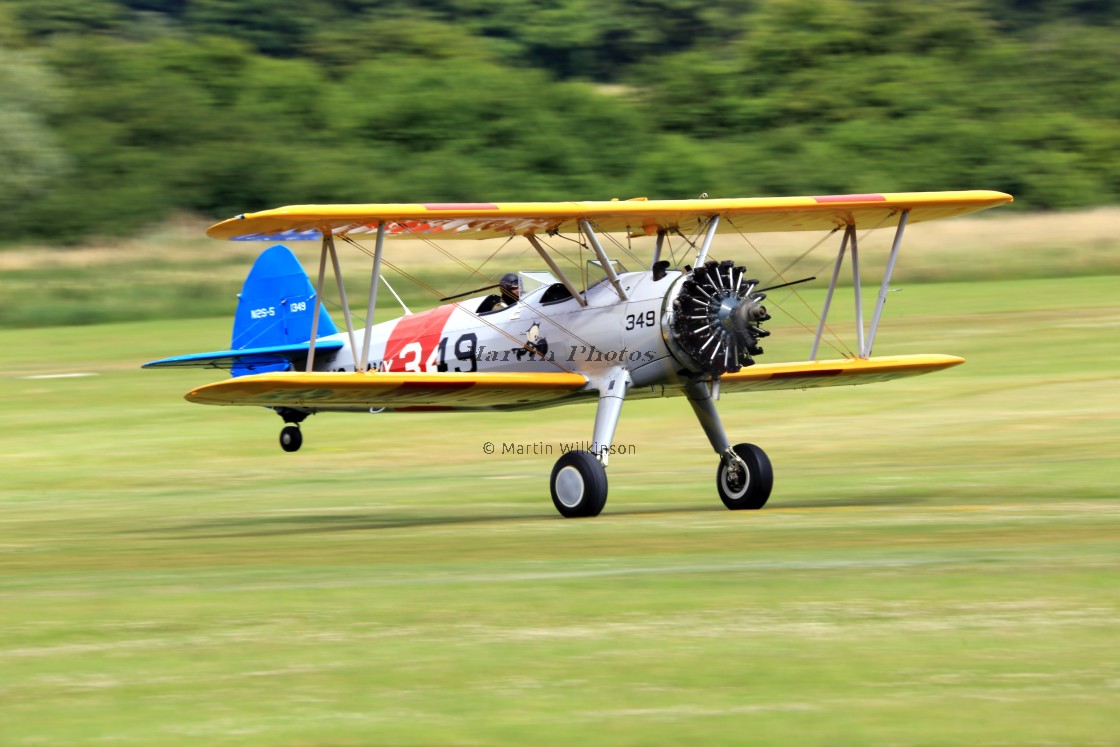 "Stearman 1349 taking off" stock image