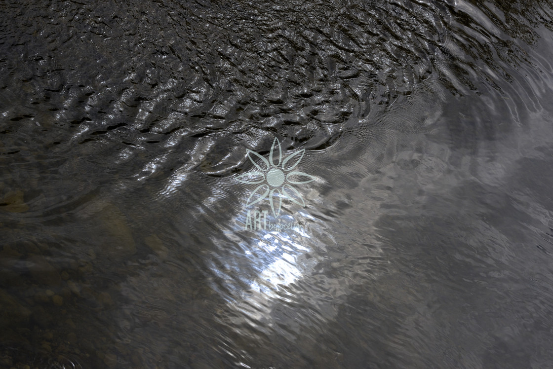 "Sun and Blue Sky Reflection in Rippled Silver Water" by Jocelyn Ball - $6.32 "Sun and Blue Sky Reflection in Rippled Silver Water" stock image