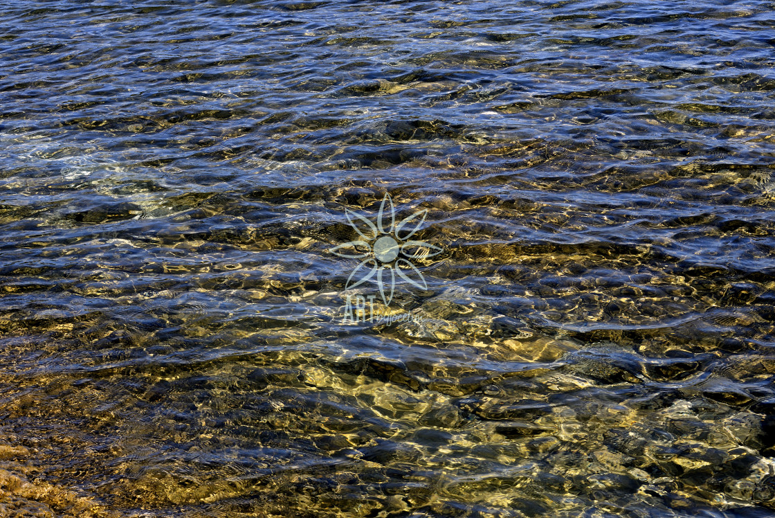 "Rippled Water Over Rock Lake Huron Tobermory" stock image