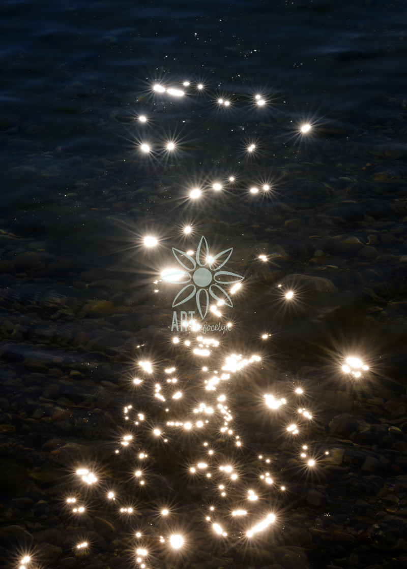 "Sunlight Sparkles on Water" stock image