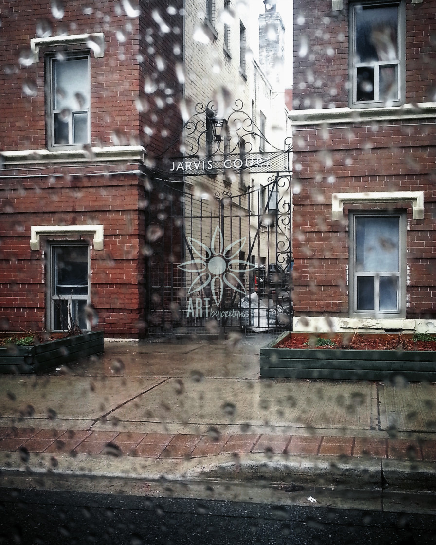 "Brick Buildings on Toronto Street Through Wet Car Window" stock image