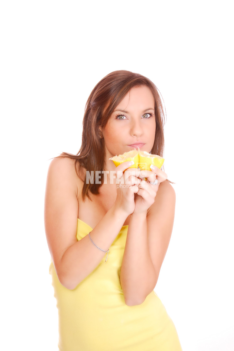 "pretty woman with orange" stock image