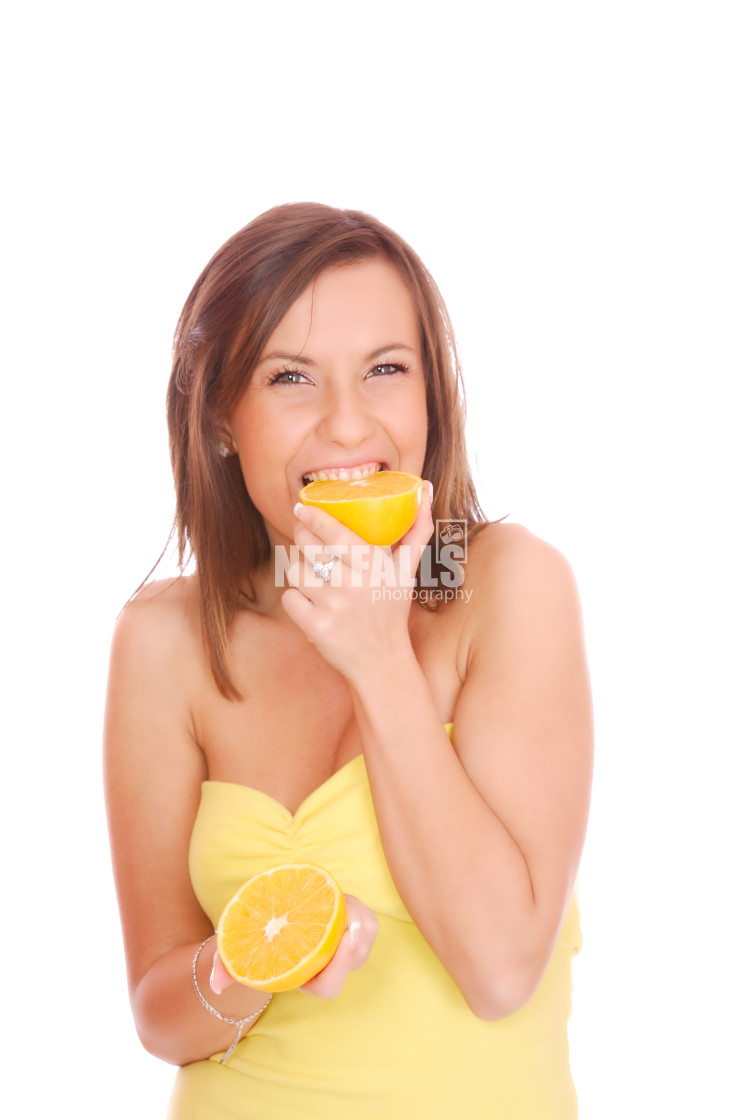 "pretty woman with orange" stock image