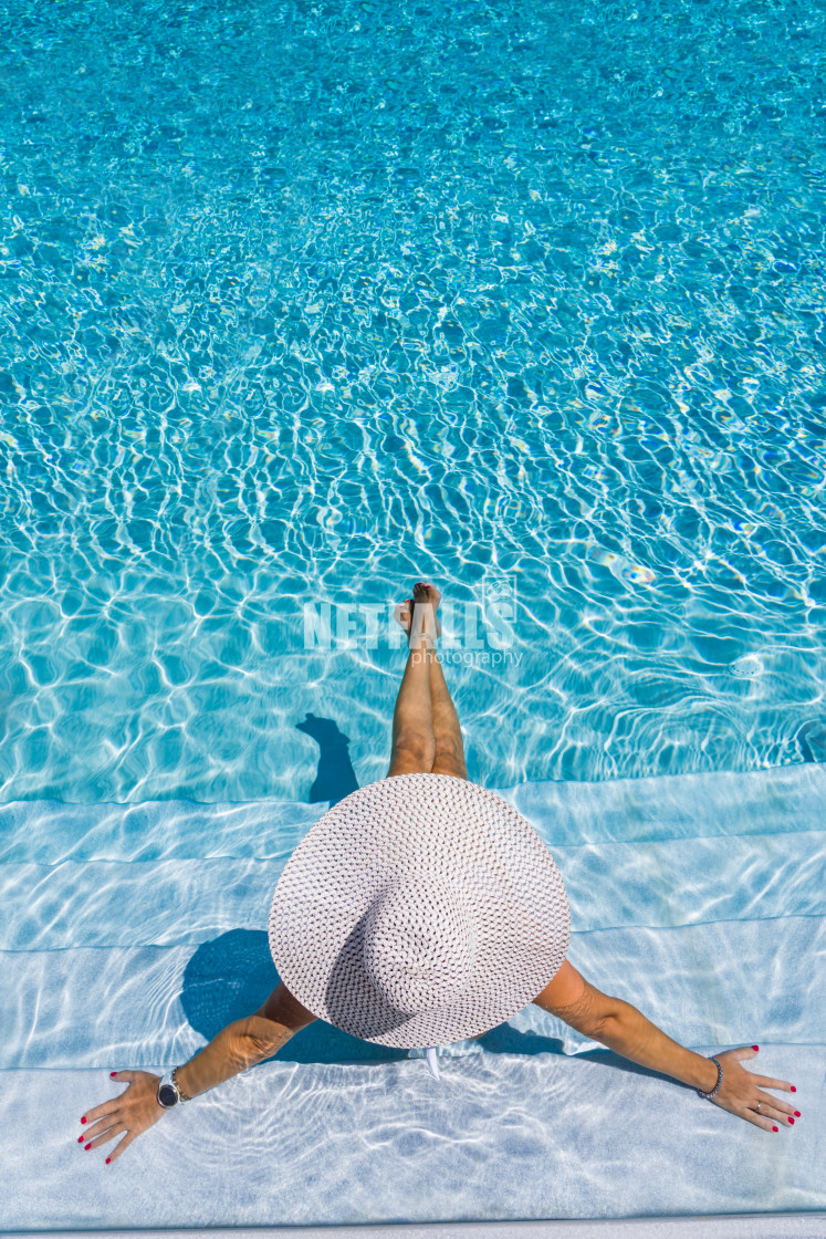 "woman in luxury spa resort near the swimming pool." stock image