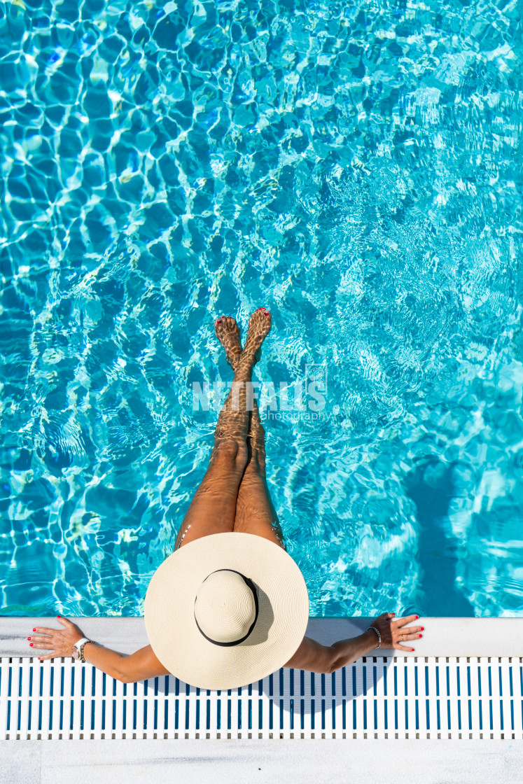 "woman in luxury spa resort near the swimming pool." stock image