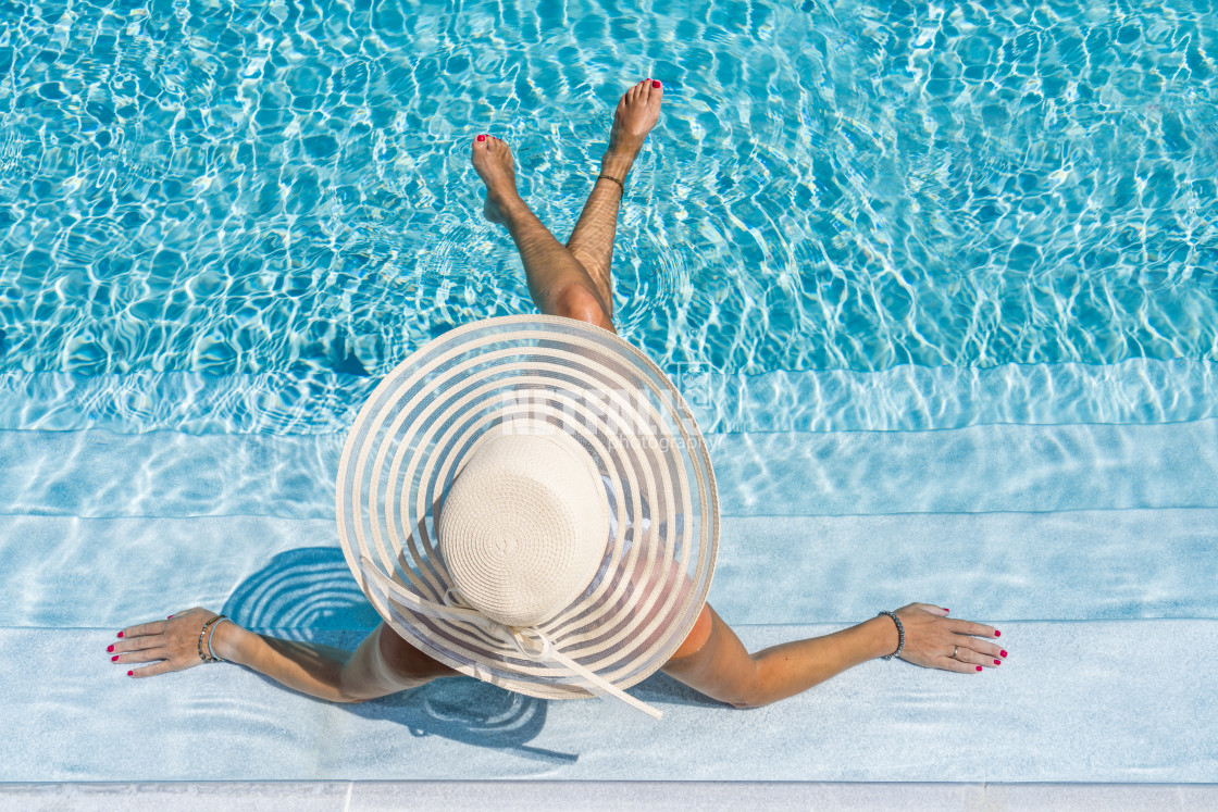 "woman in luxury spa resort near the swimming pool." stock image