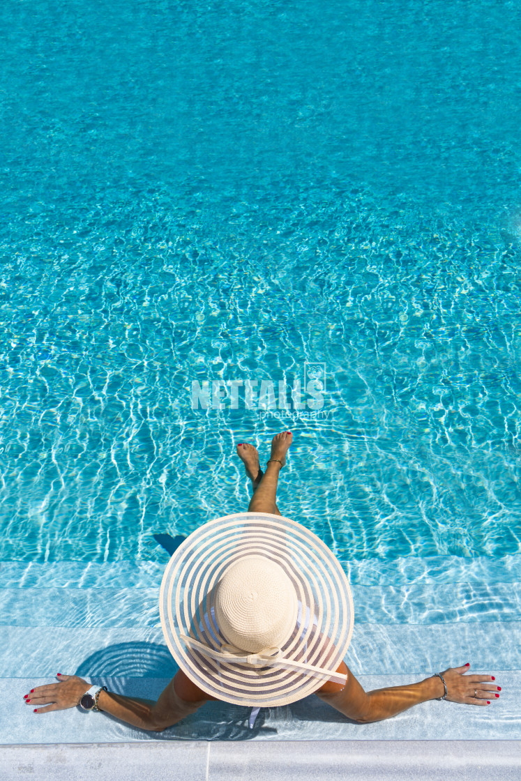 "woman in luxury spa resort near the swimming pool." stock image