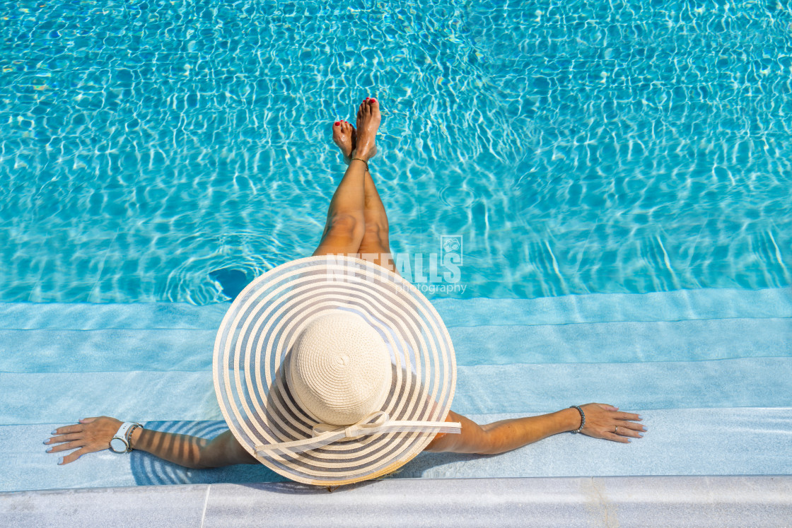 "woman in luxury spa resort near the swimming pool." stock image