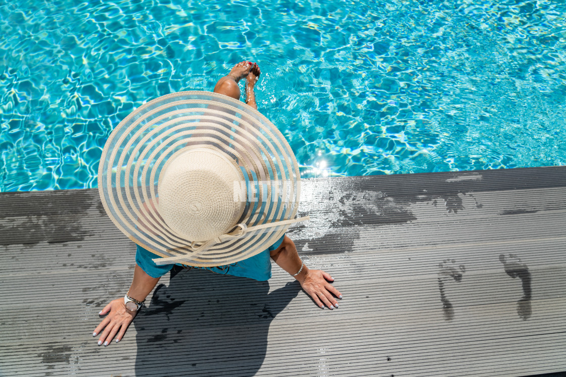 "woman in luxury spa resort near the swimming pool." stock image