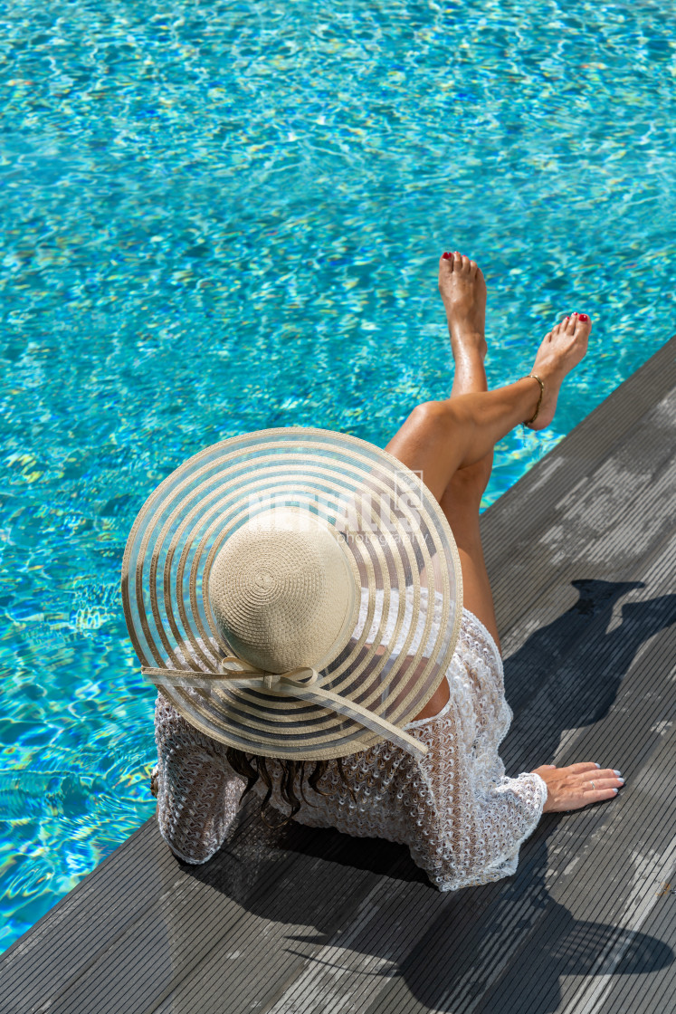 "woman in luxury spa resort near the swimming pool." stock image