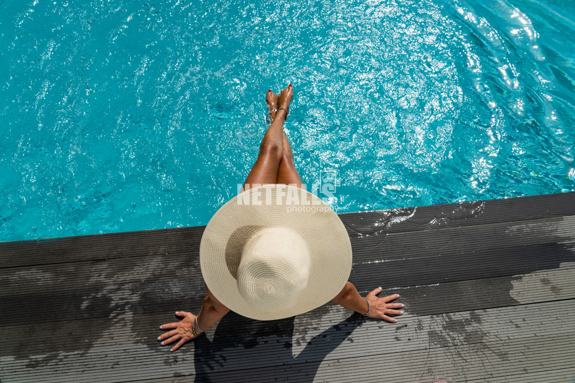 "woman in luxury spa resort near the swimming pool." stock image