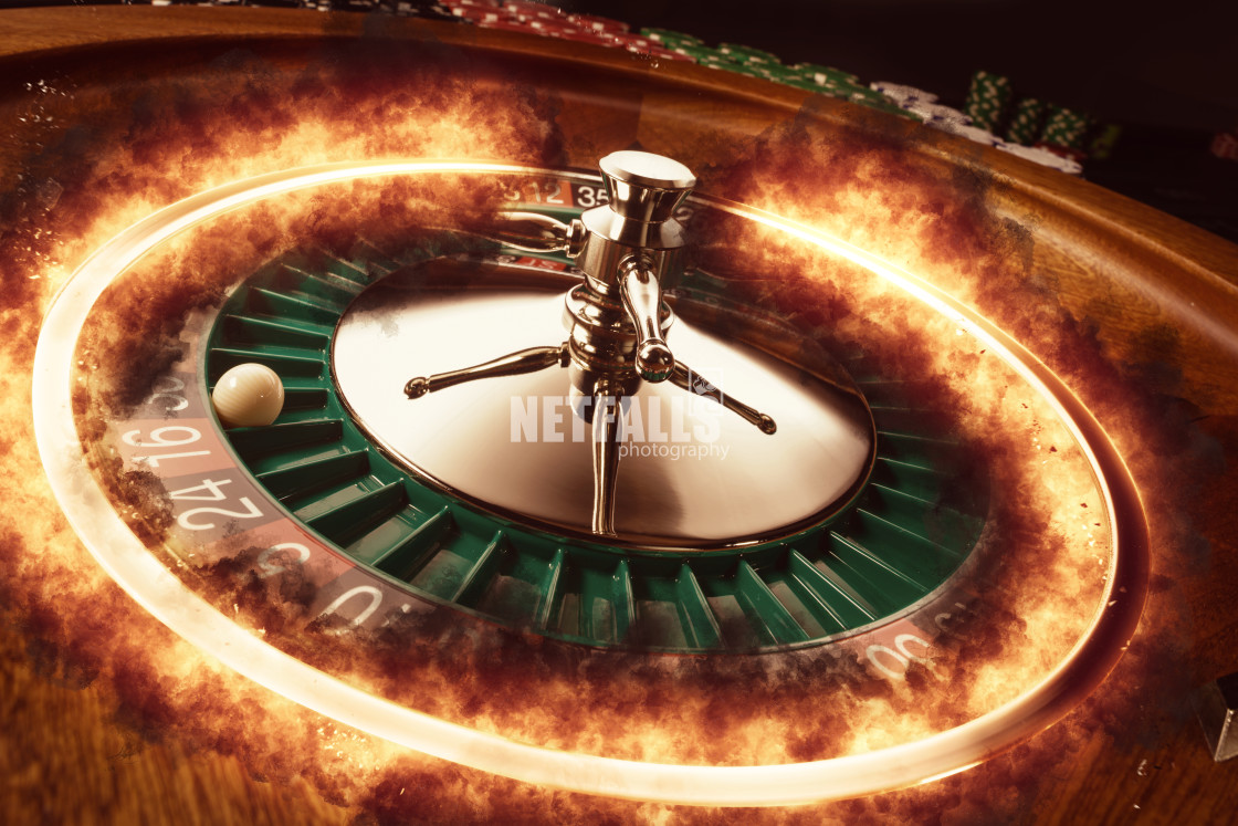 "Flaming casino roulette wheel" stock image