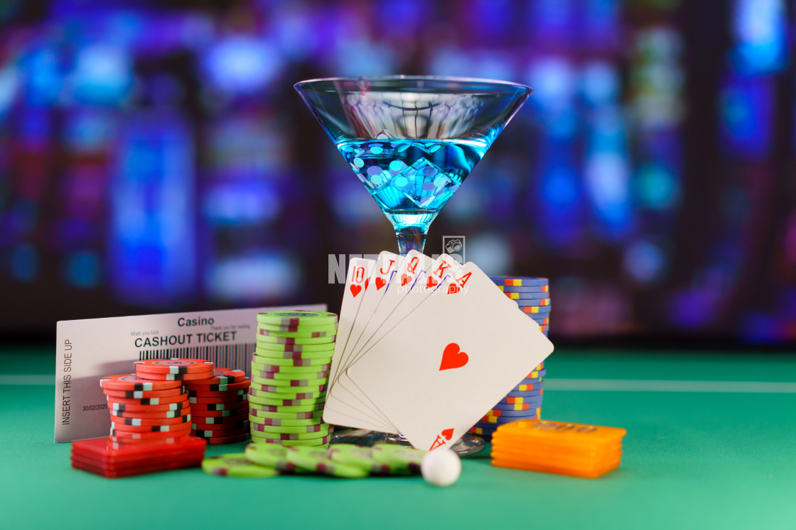 "cocktail glass on the casino gambling table" stock image