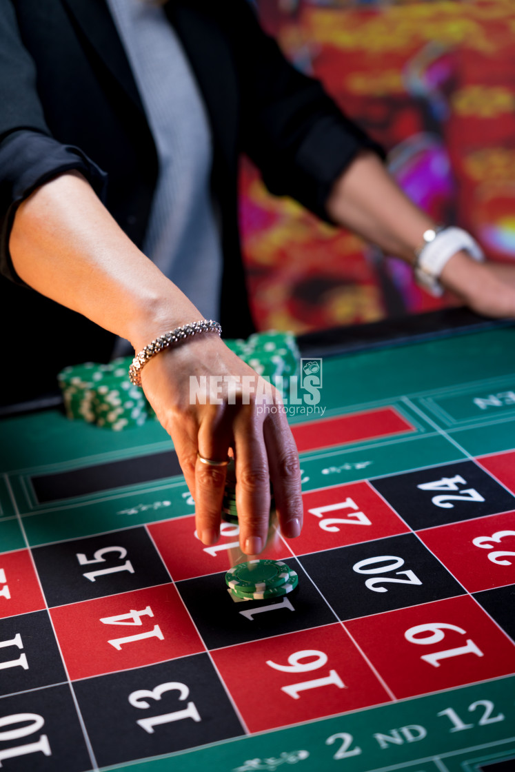 "Woman playing at the roulette table" stock image