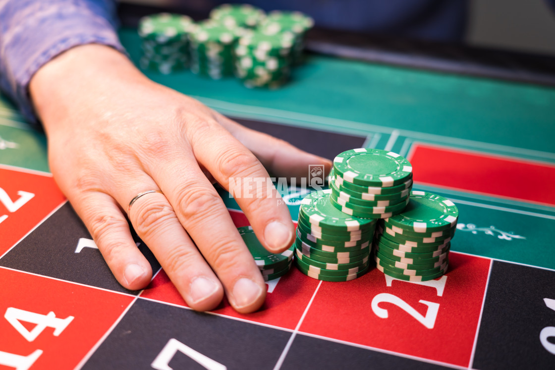 "Man playing roulette at the casino" stock image