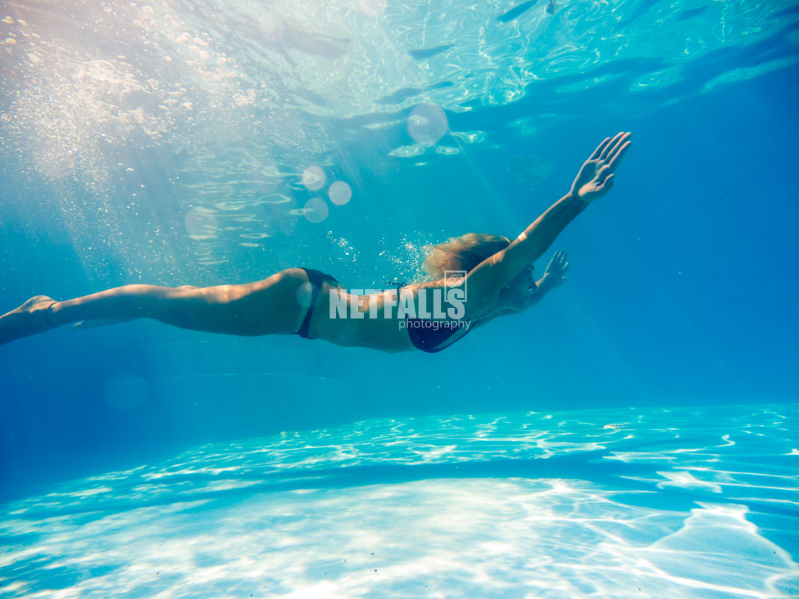 "Woman underwater at the pool" stock image