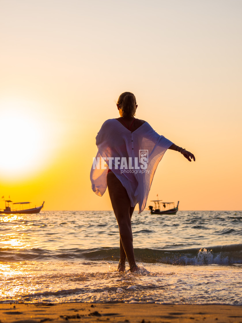 "Woman in swiming suit posing on the beach" stock image