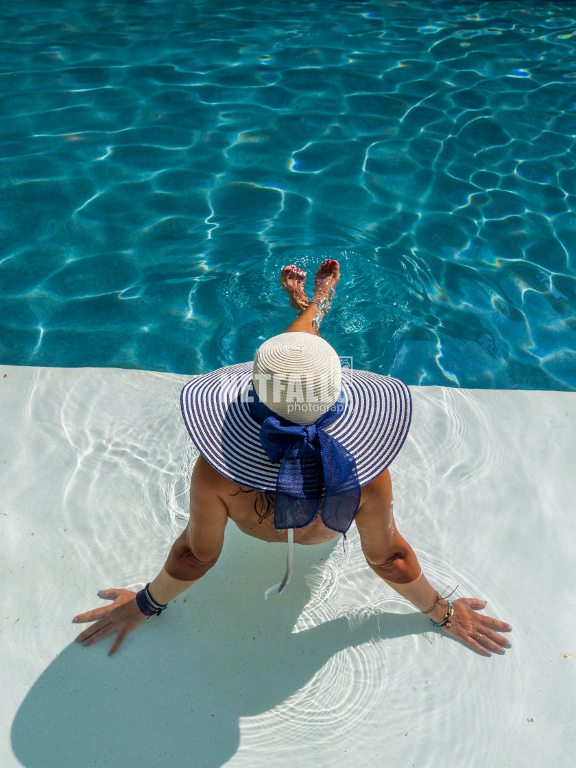 "woman in luxury spa resort near the swimming pool." stock image