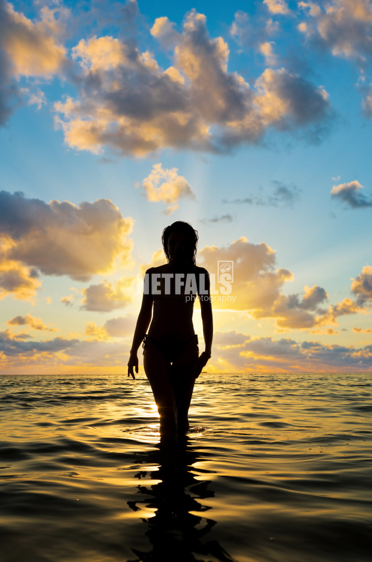 "Woman in swiming suit posing on the beach" stock image