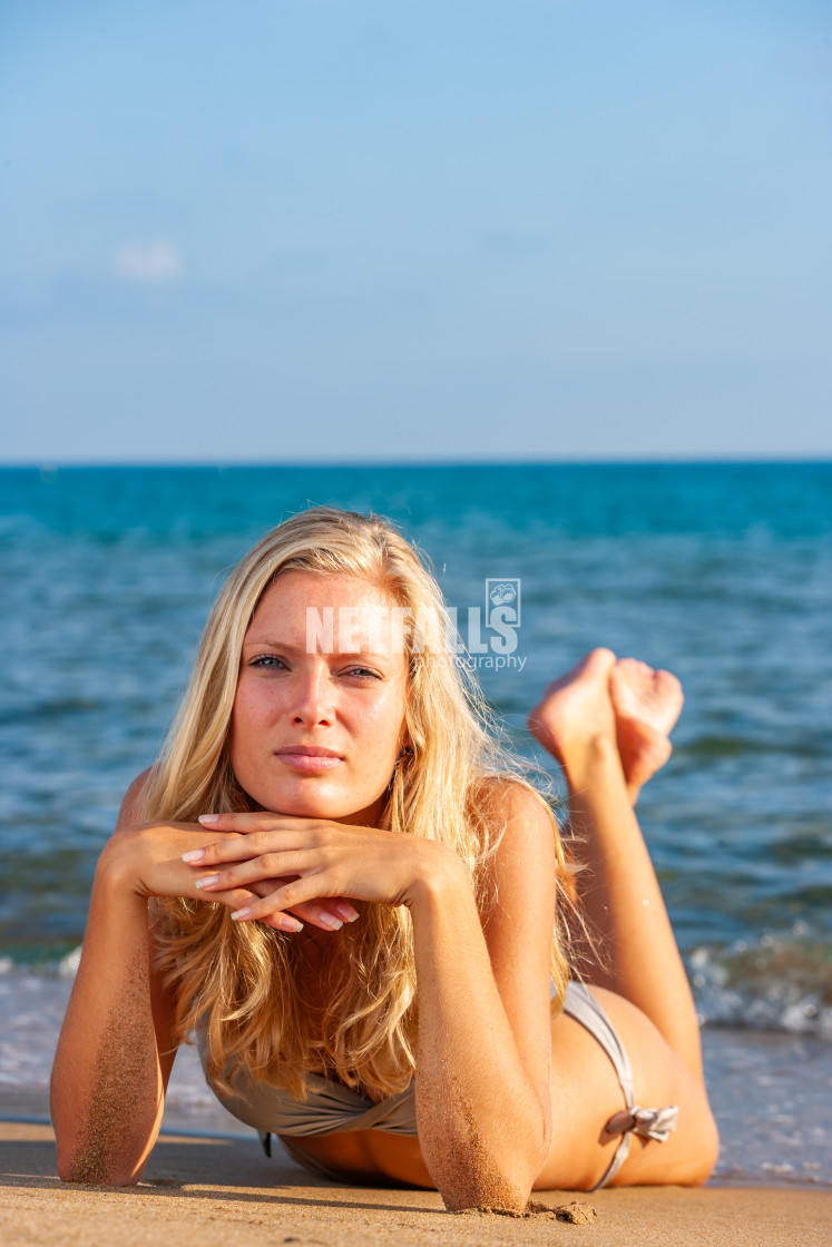 "Woman in bikini at the beach" stock image