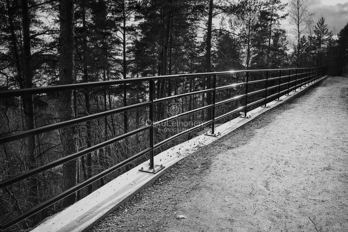 "Between (Metal Fence)" stock image