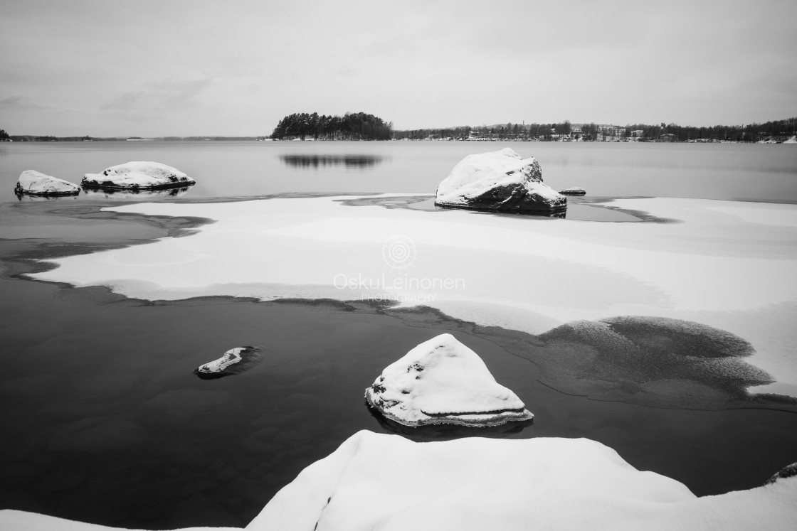 "Snowy Lake View III (Rocks)" stock image