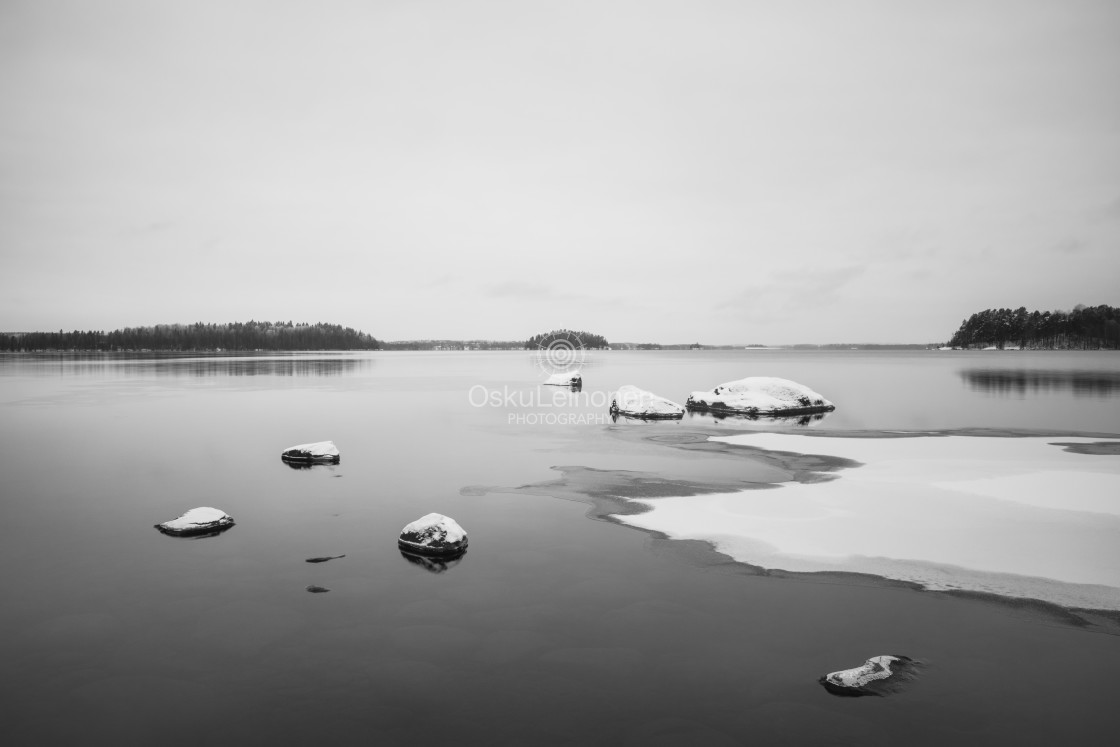 "Snowy Lake View VI (Rocks)" by Osku Leinonen Photography - $18.86 "Snowy Lake View VI (Rocks)" stock image