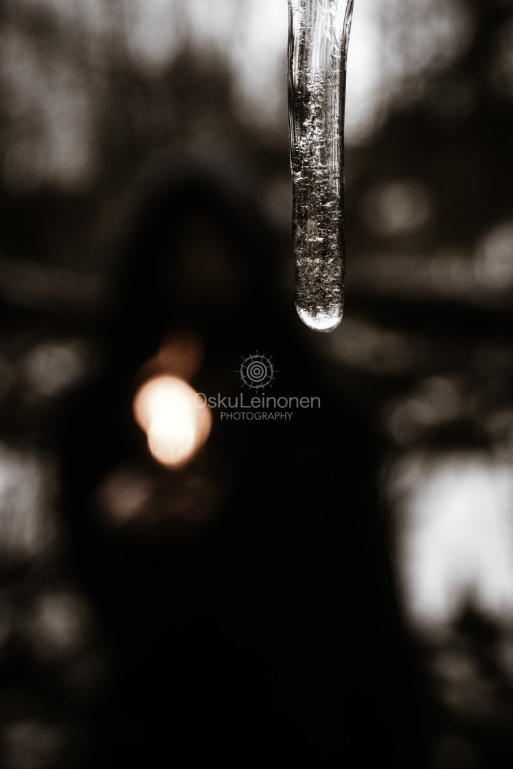 "Icicle V (Hooded Man Warm Colours)" stock image