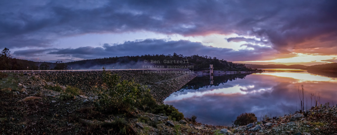 "sunrise with lake and clouds panorama" stock image