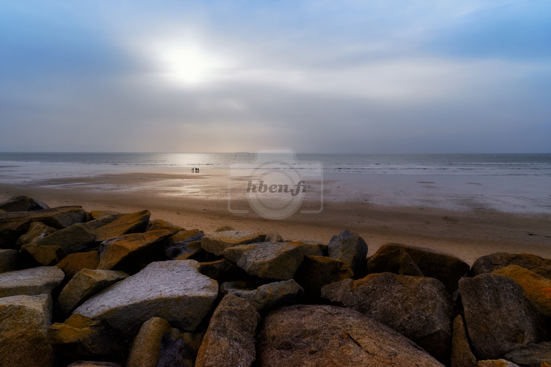 "Foggy sunset in Hauteville-sur-Mer beach" stock image