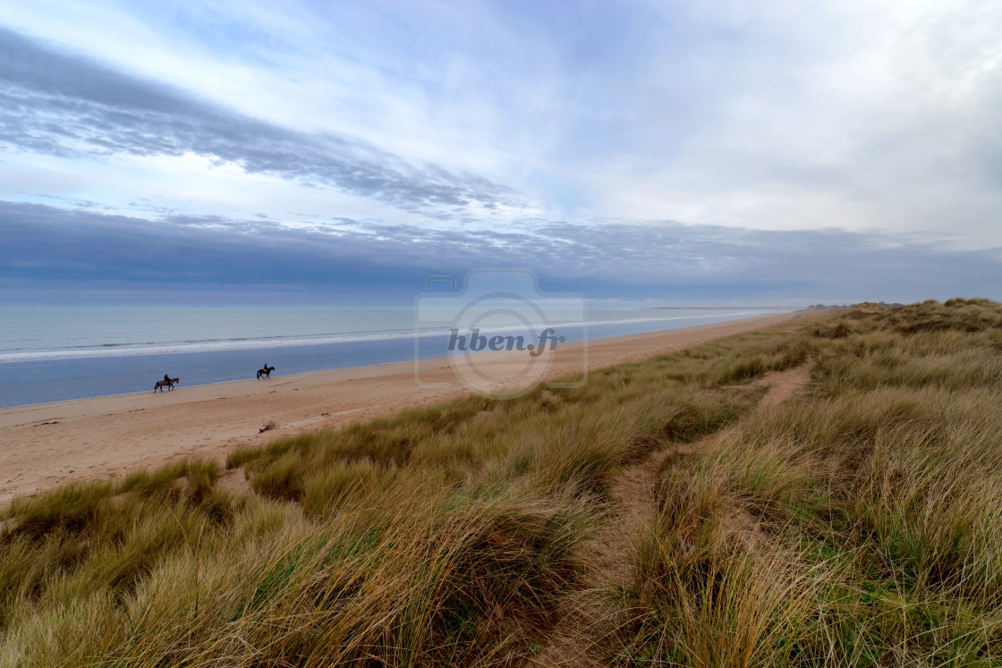 "Riders on the beach" stock image