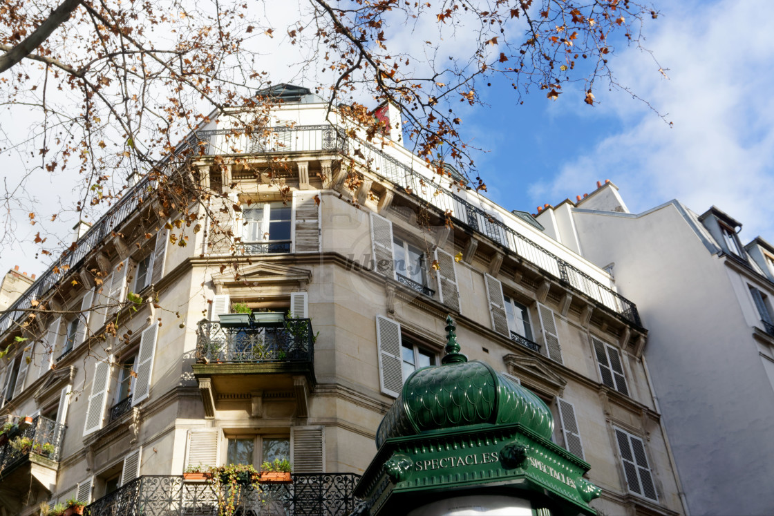 "Parisian column and old building" stock image