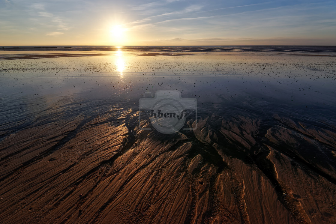 "Low tide sunrise" stock image