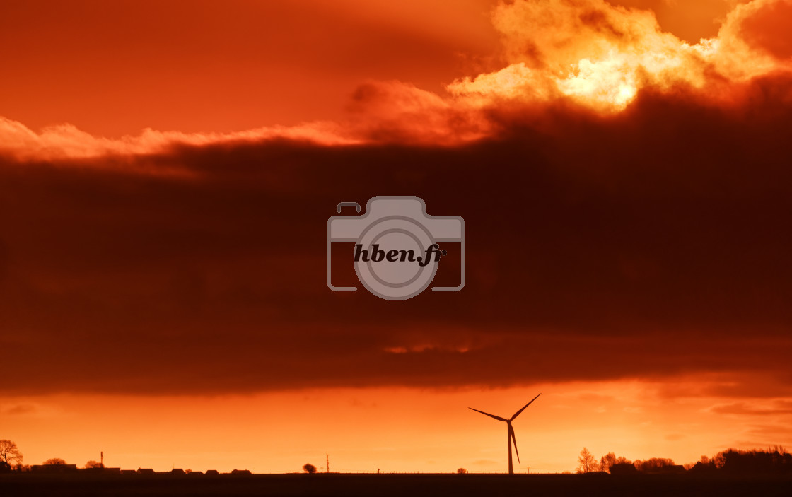 "Wind turbine sunrise" stock image