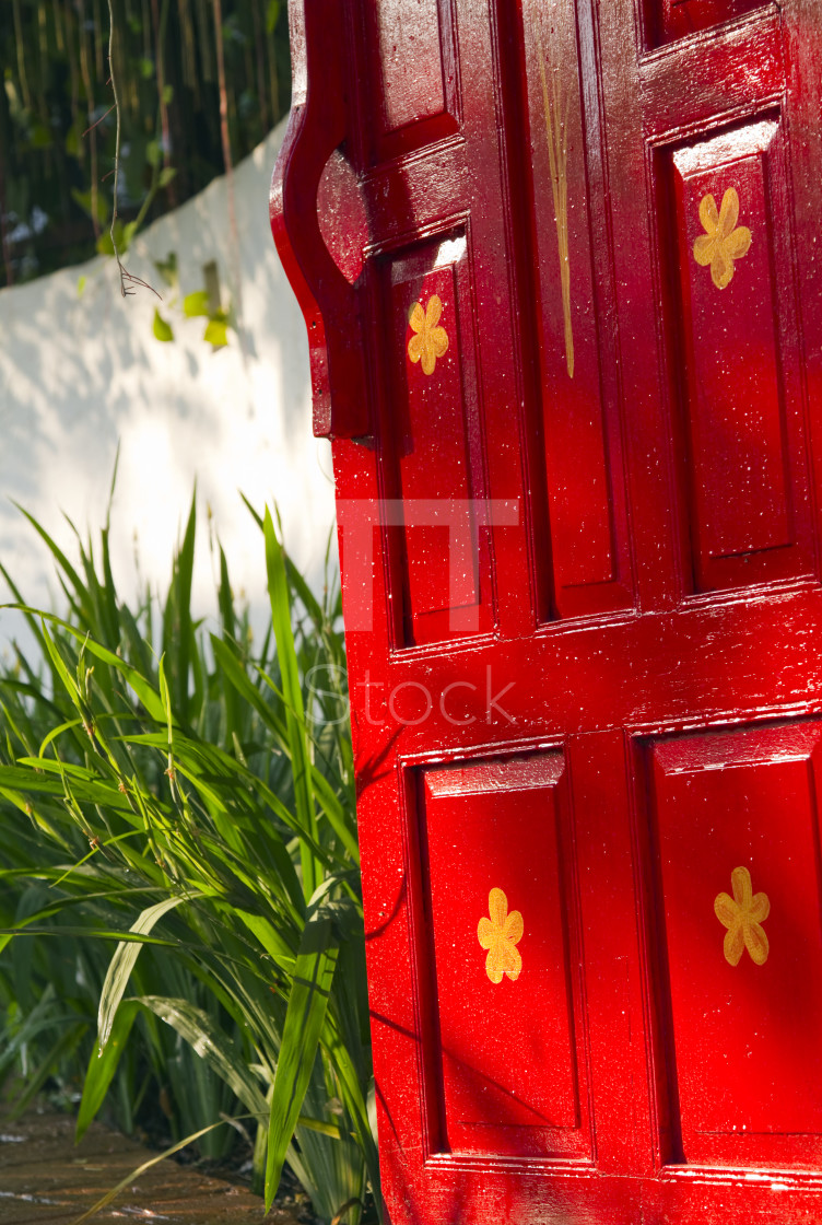 "Bright red wooden gate leading to a lush garden" by TTStock - $7.46 "Bright red wooden gate leading to a lush garden" stock image