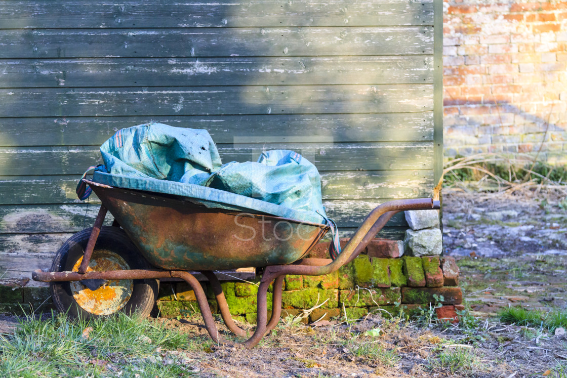 "Old rusty wheelbarrow" by TTStock - $7.54 "Old rusty wheelbarrow" stock image