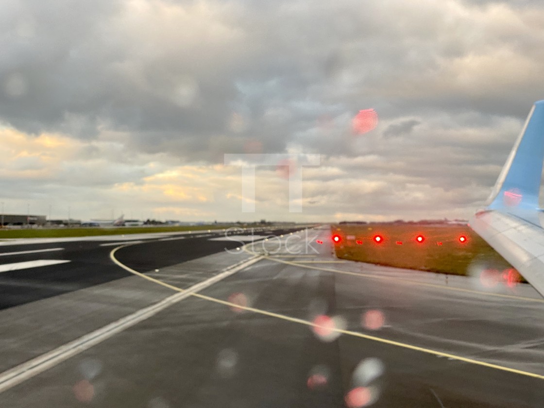 "Looking out aircraft window on runway." by TTStock - $7.46 "Looking out aircraft window on runway." stock image