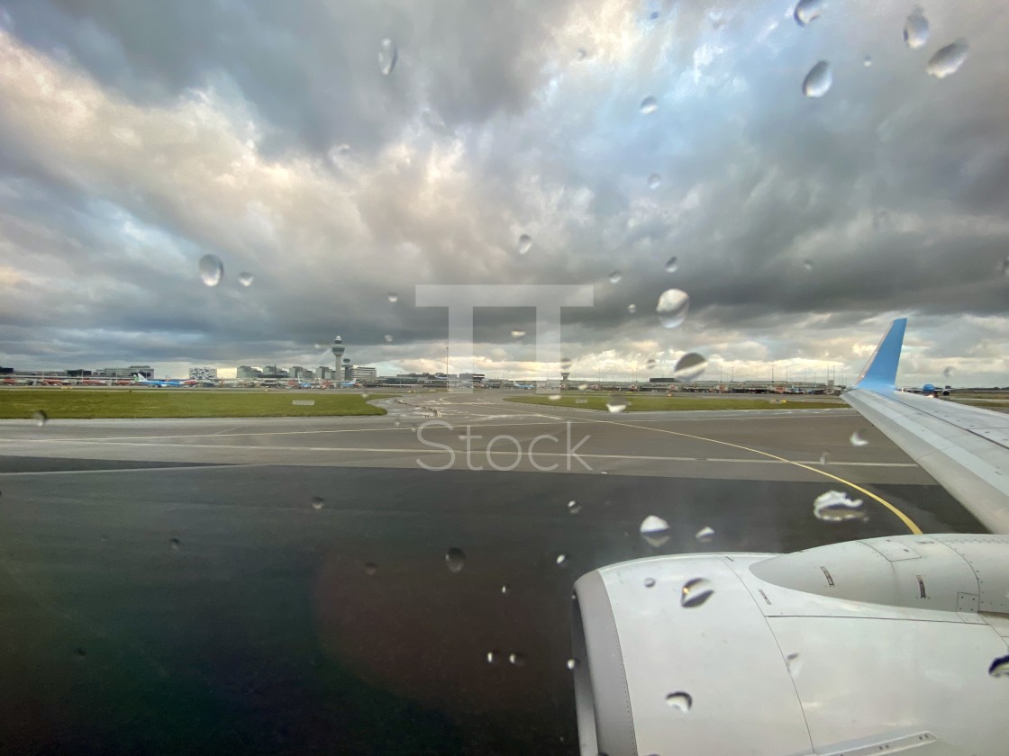 "Ready for takeoff at the airport on a bad weather rainy day." by TTStock - $7.46 "Ready for takeoff at the airport on a bad weather rainy day." stock image