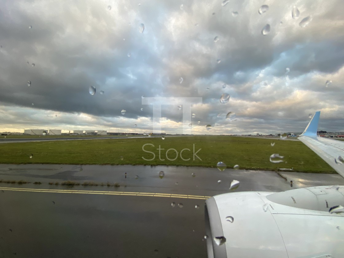 "Taxiing at Schiphol airport on a bad weather rainy day." by TTStock - $7.54 "Taxiing at Schiphol airport on a bad weather rainy day." stock image
