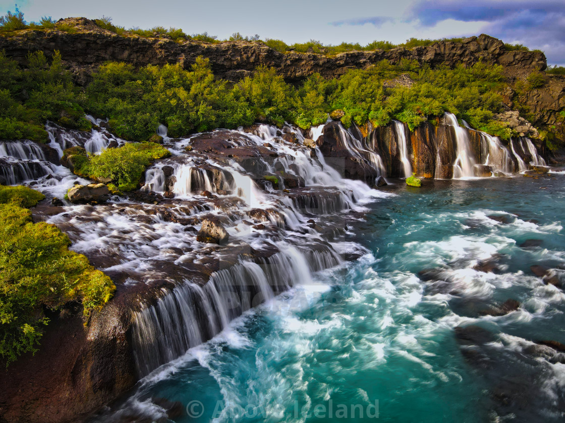 "hraunfossar waterfalls" stock image