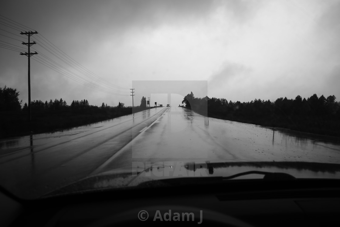 "Rainy Drive 1, Sault Sainte Marie, Michigan" by Adam J. - $12.57 "Rainy Drive 1, Sault Sainte Marie, Michigan" stock image